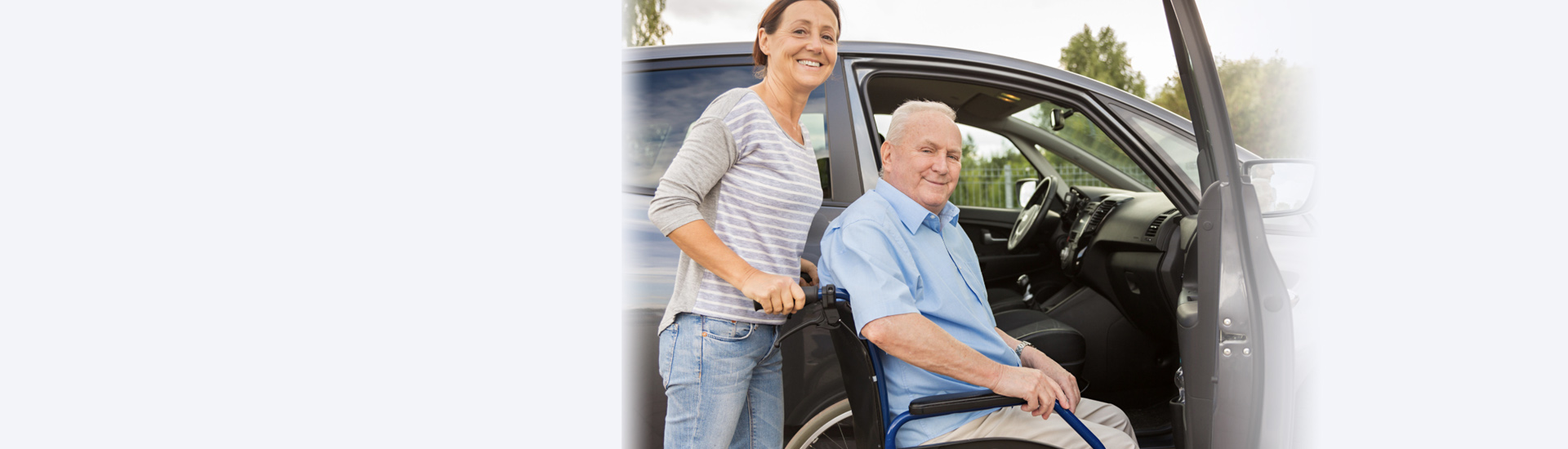 Home caregiver dressing senior